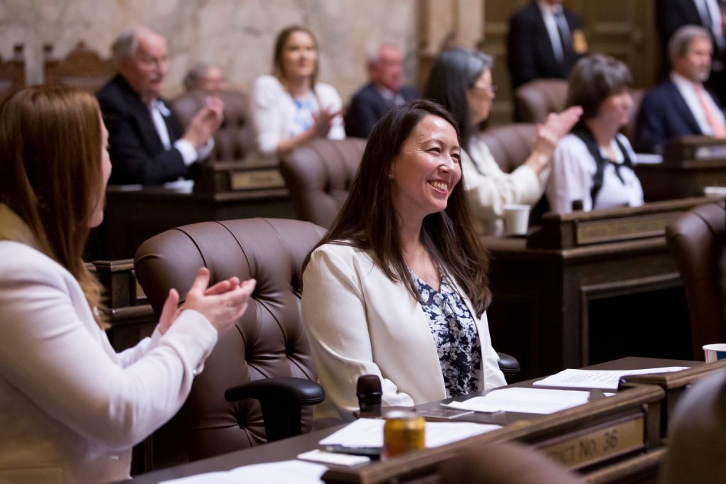 Rep. Duerr seated at her floor desk