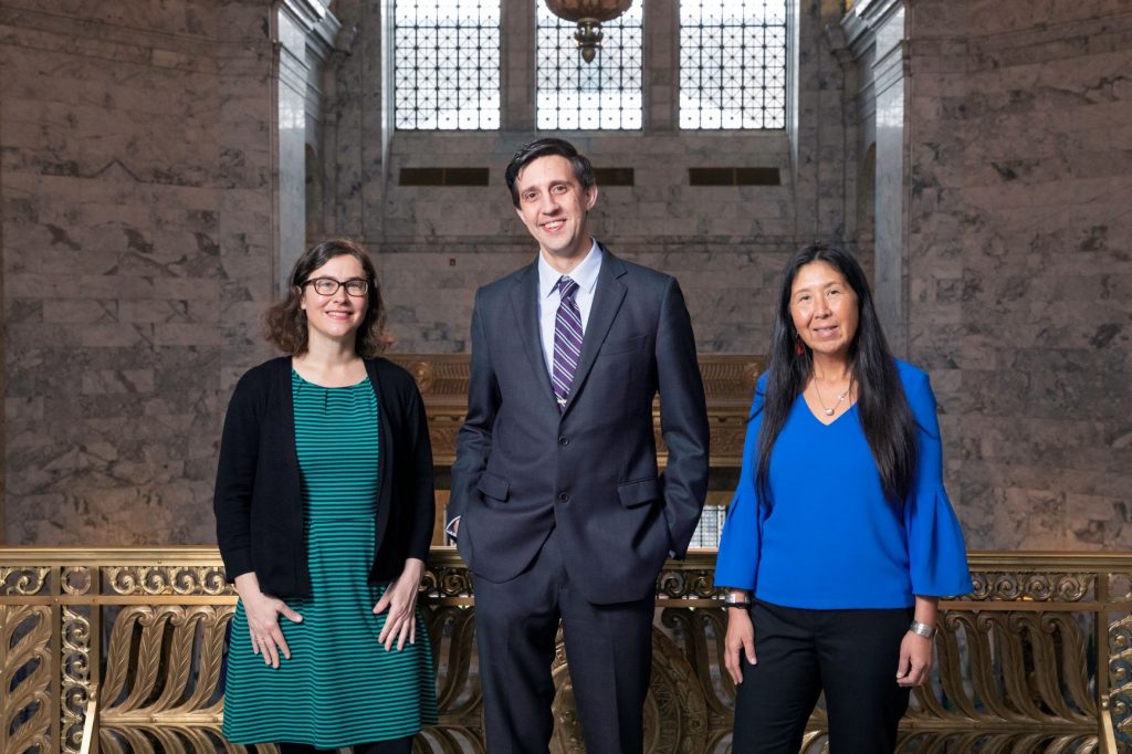 Sen. Lovelett, Rep. Lekanoff, & Rep. Ramel standing next to each other in the Legislative Building