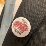 A pin showing a picture of a tardigrade with the text "Small but mighty"