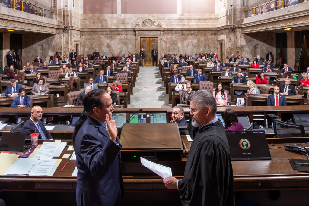 Rep. Chris Stearns is sworn in as Speaker Pro Tempore by Justice Steven C. González. (LSS) on day three of the 2025 legislative session.