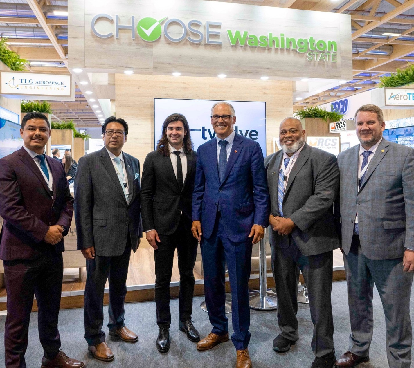 Rep. Cortes, legislative colleagues, and Gov. Inslee tour the ‘Choose WA’ booth at the Paris Air Show. (Credit Office of Governor)
