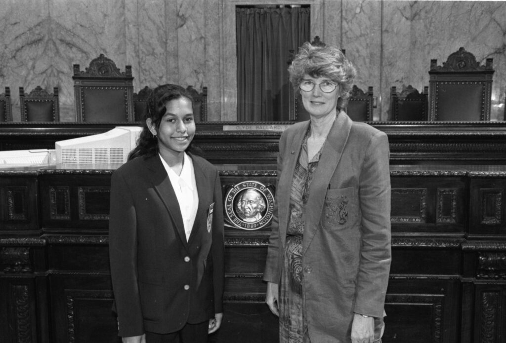 Rep. Brianna Thomas as a page with Representative Gigi Talcott.